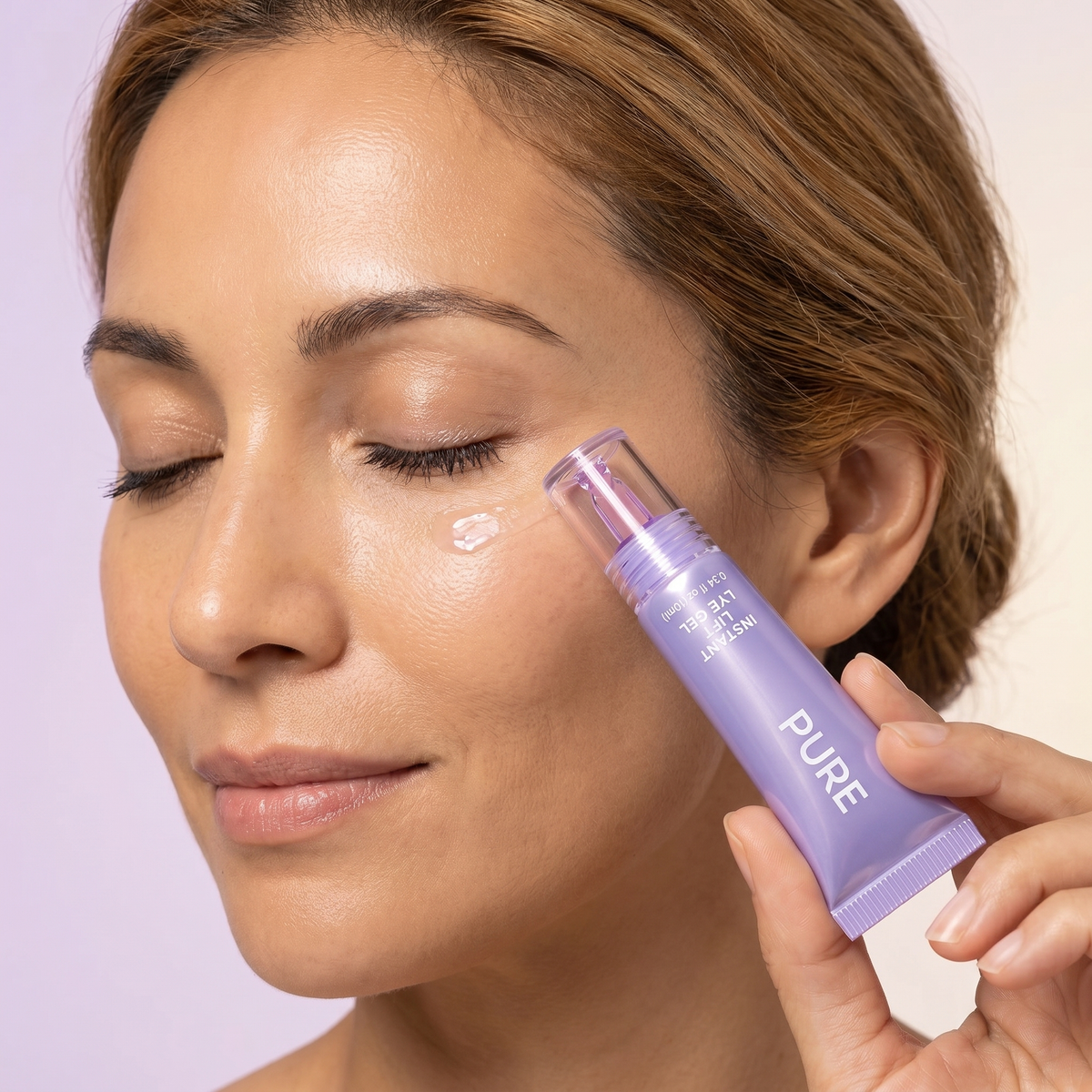 Woman applying skincare